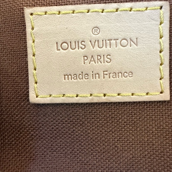Louis Vuitton canvas rolling duffle bag, gently used. - Picture 2 of 14